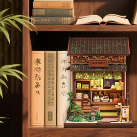 CUTEBEE miniature house assembly phase highlights intricate wooden puzzle details.