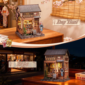 Cutebee sakura tree and kimono display creates serene Japanese vignette.