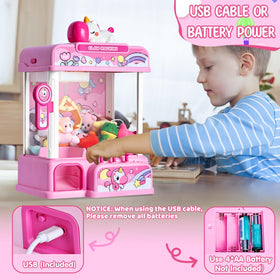 CWLAKON claw machine pink open chamber shows prize-dispensing action