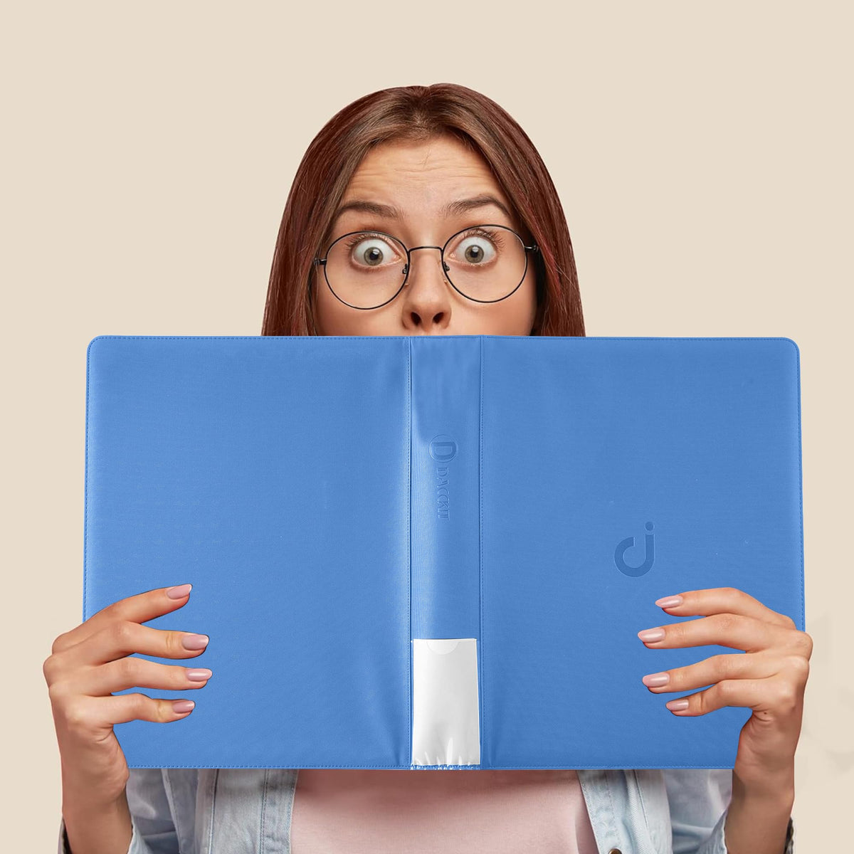 D DACCKIT binder interior shows transparent pockets for easy card viewing.
