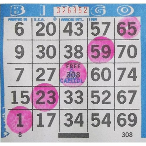 Dab-O-Ink pink bingo dauber in use with vivid ink on a bingo card