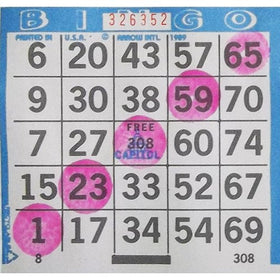 Dab-O-Ink pink bingo dauber in use with vivid ink on a bingo card