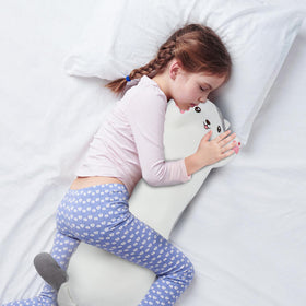 Dalmao cat pillow on sofa, versatile decor and supportive cushion for watching TV.