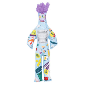 Dammit Doll on a cluttered desk lightens desk chaos with humor.