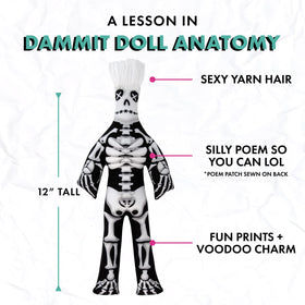 Dammit Doll side view emphasizes resilience and a huggable pose.