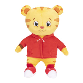 Daniel Tiger's Neighborhood plush held by a child during pretend play.