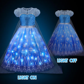 Davvew dress features a four-layer gauze skirt for airy twirls.