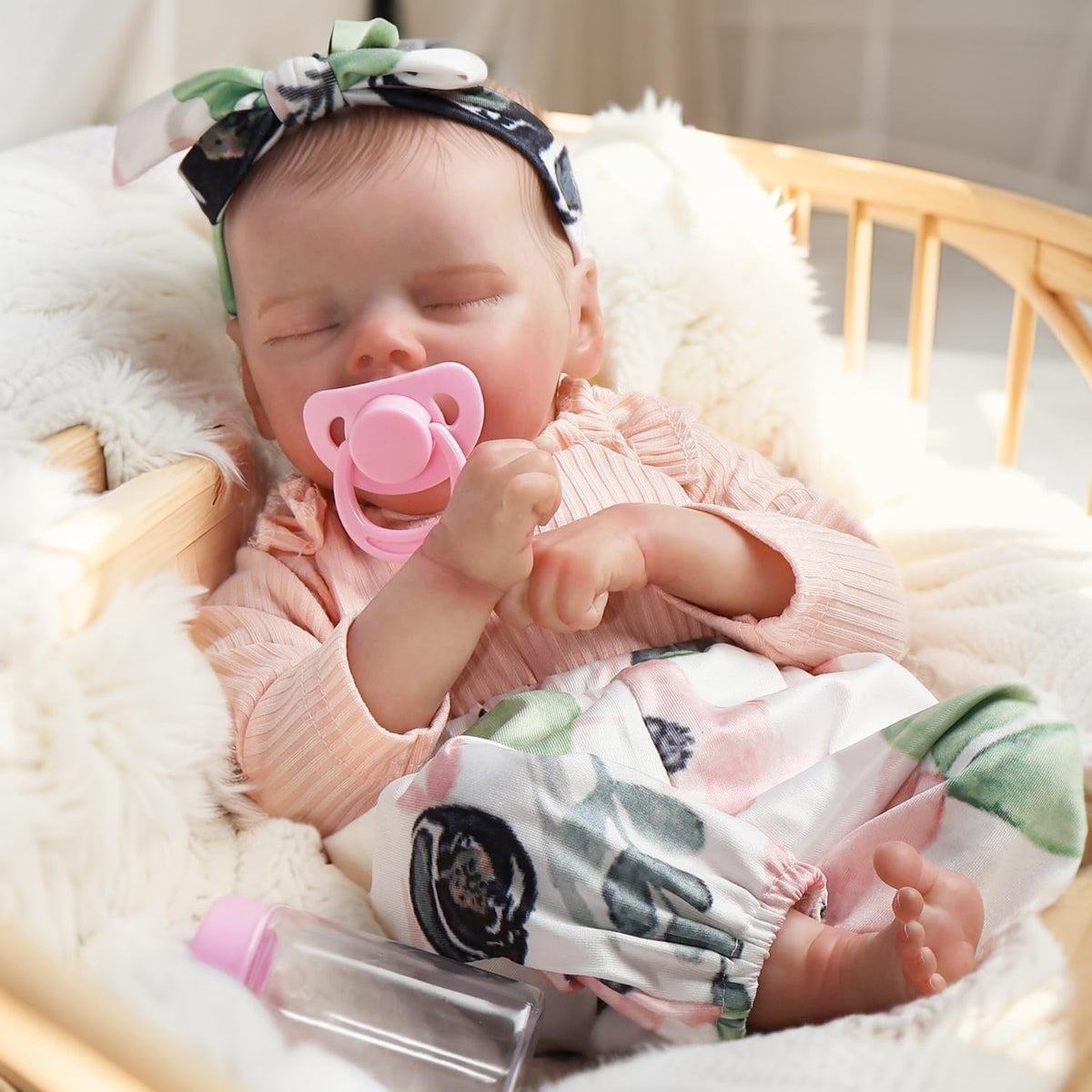 DAYOFF KIDS lifelike doll sleeping face for calm, comforting pretend play.