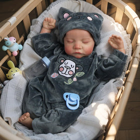 DAYOFF KIDS Reborn 18in doll in sleeping pose for cozy, realistic naptime play
