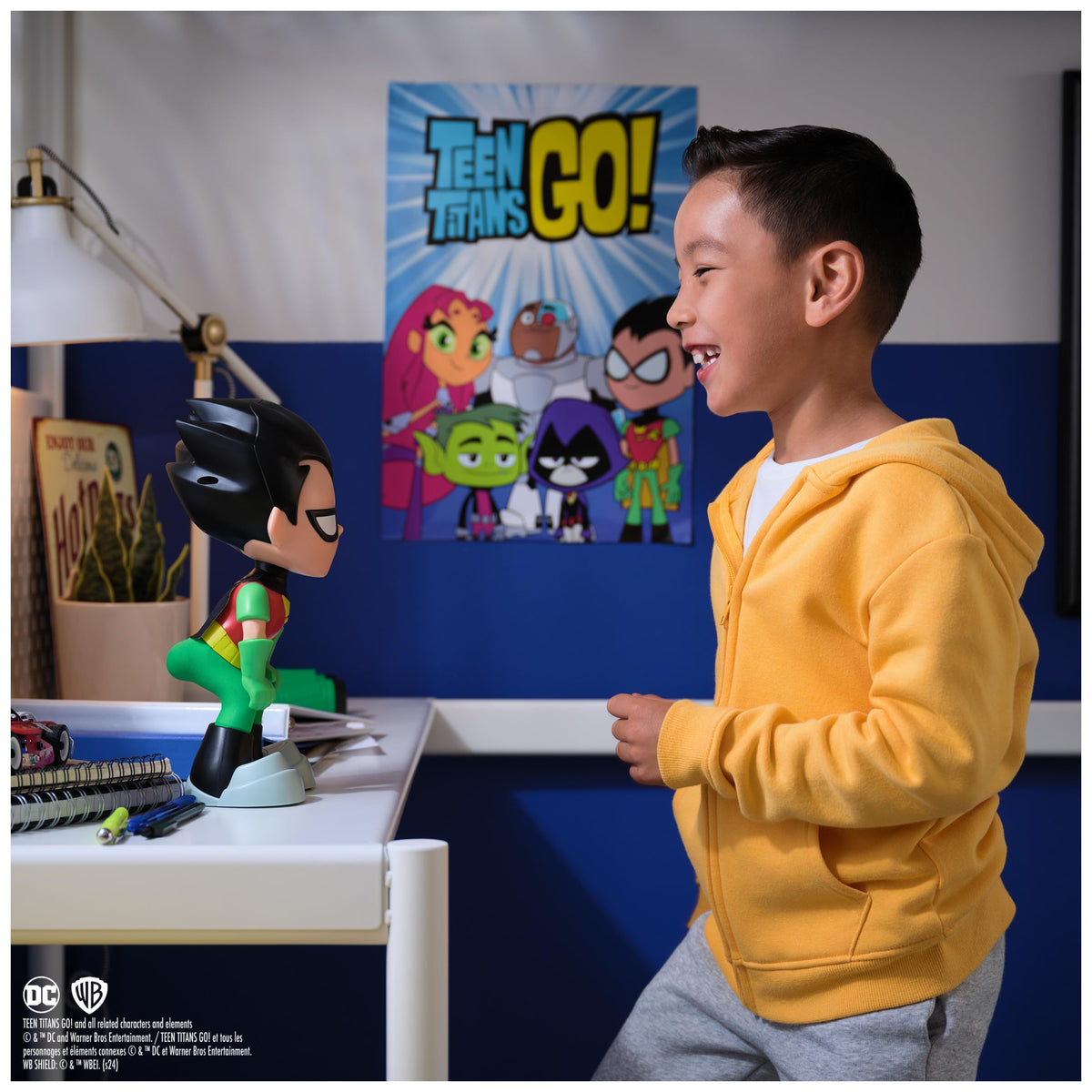 DC Comics Robin dancing figure spins to catchy tunes for kids.