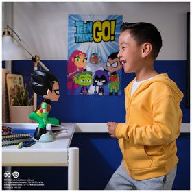 DC Comics Robin dancing figure spins to catchy tunes for kids.