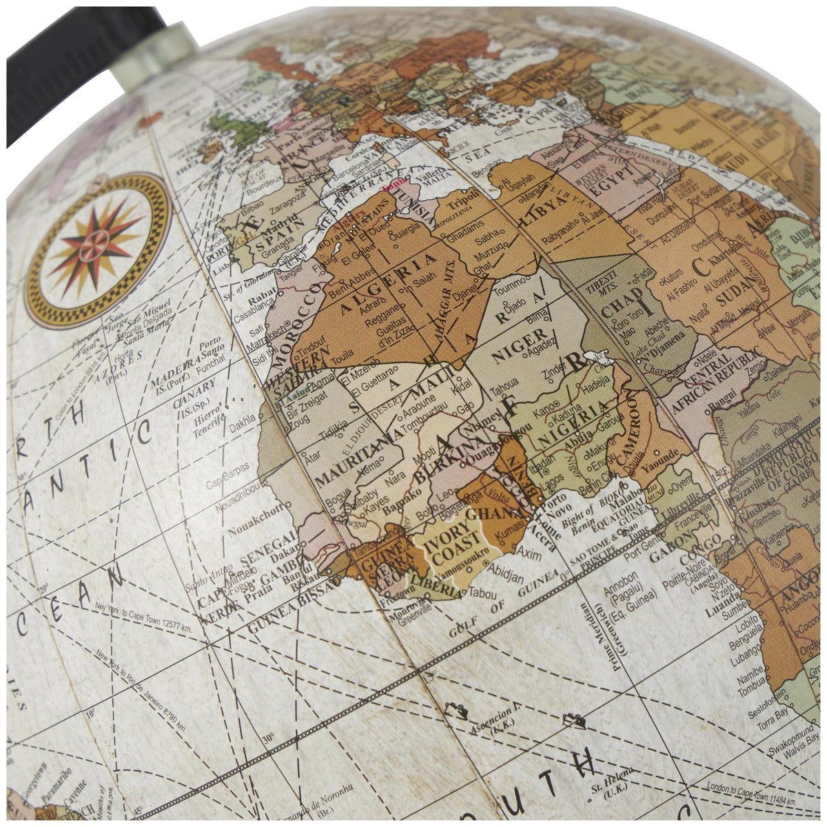Deco 79 globe brass finials highlight vintage-inspired style