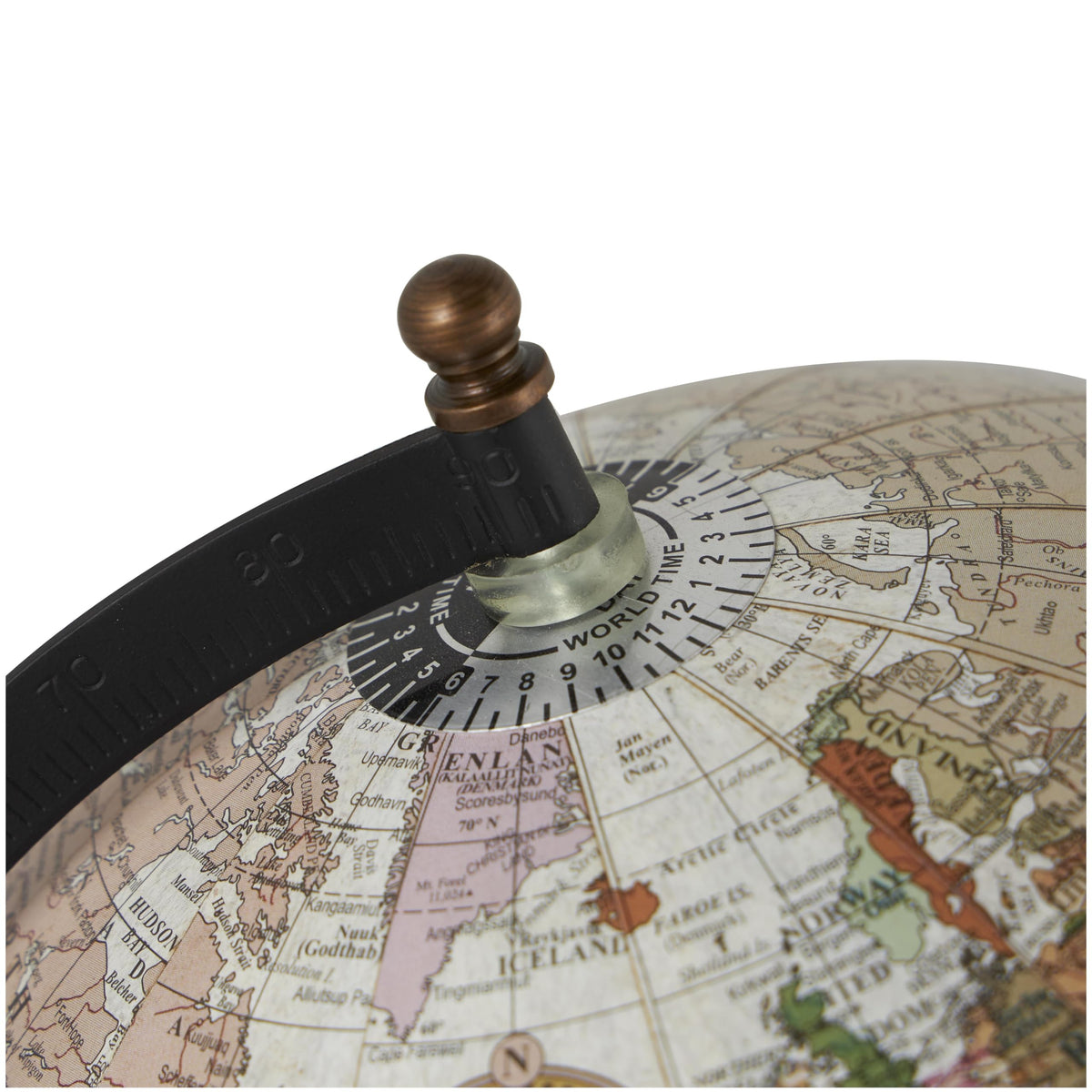 Deco 79 globe on coffee table demonstrates compact tabletop elegance