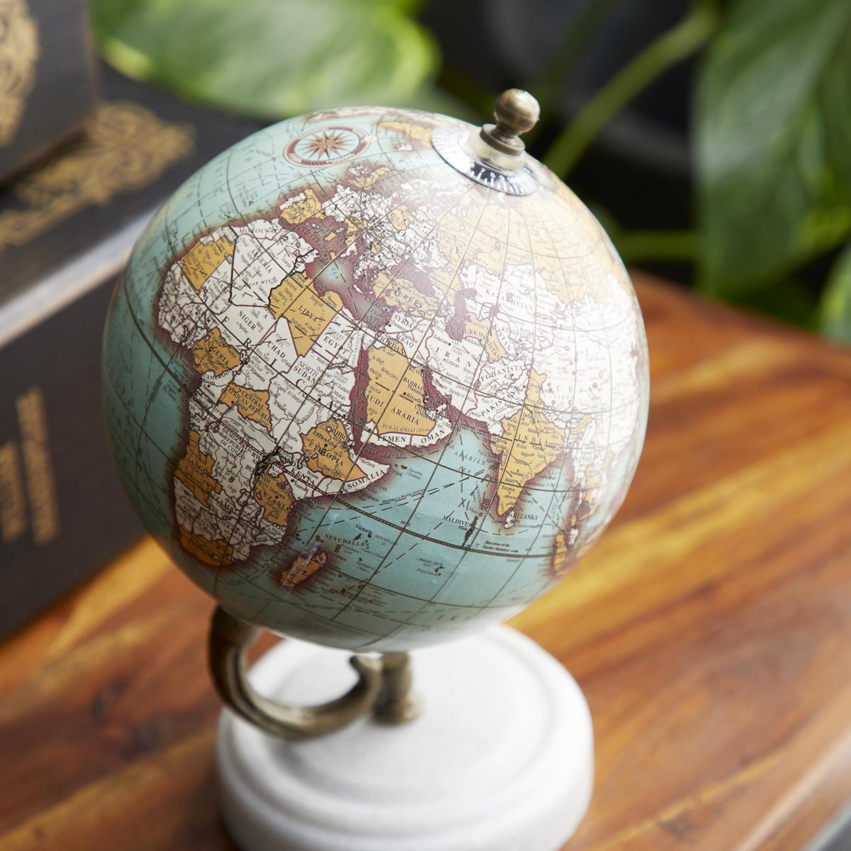 Authentic globe design blends contemporary and classic aesthetics in a living room.