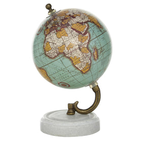 Deco 79 marble globe on teal base creates an elegant focal point.