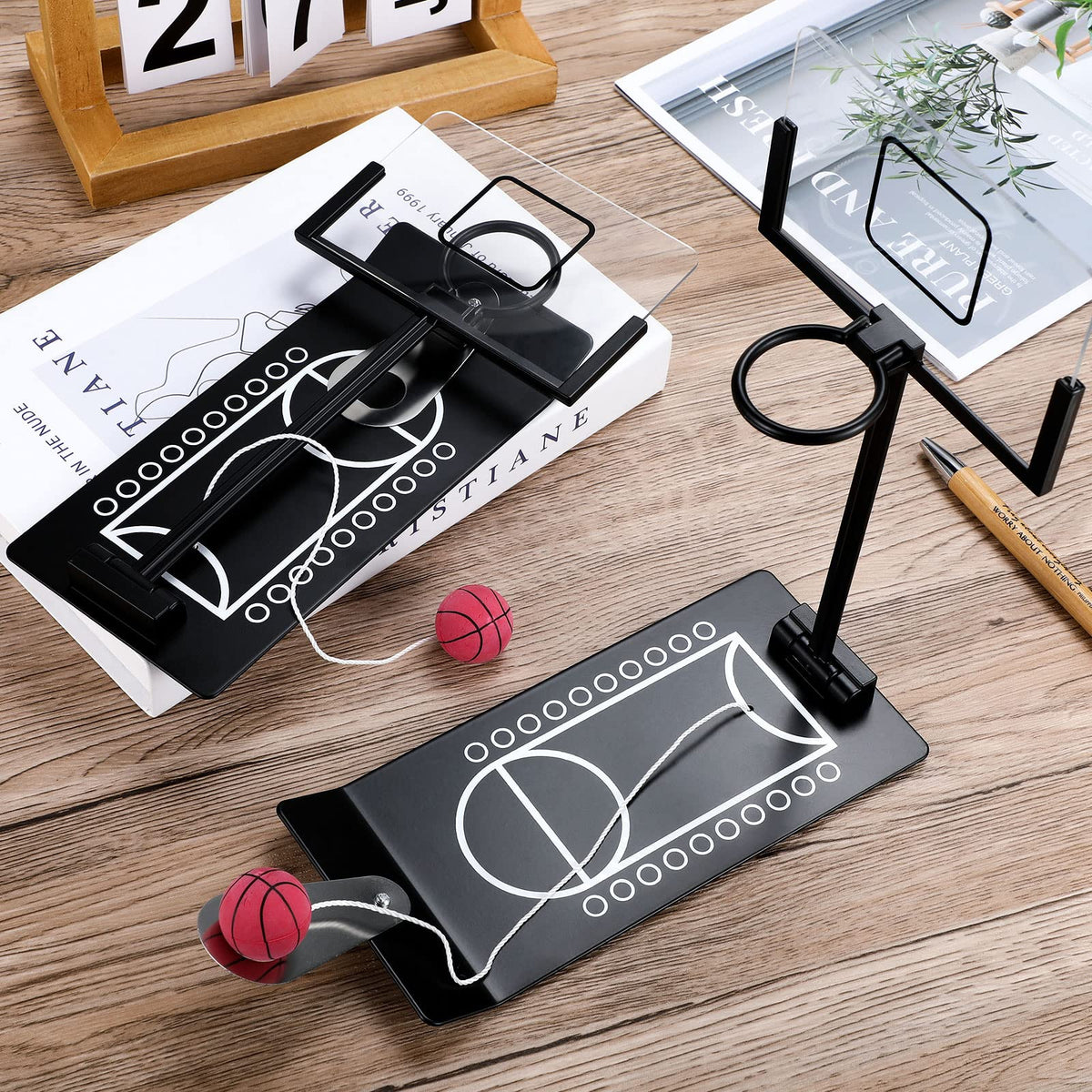 Deekin desktop basketball with metal base for stable play on the desk.