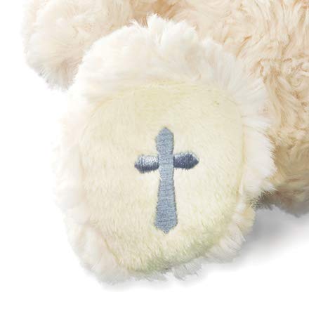 DEMDACO bear with silvery cross on the foot adds meaningful detail for gifts