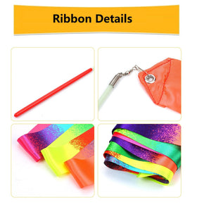 Dervea rainbow wand capture a colorful display at outdoor festival.