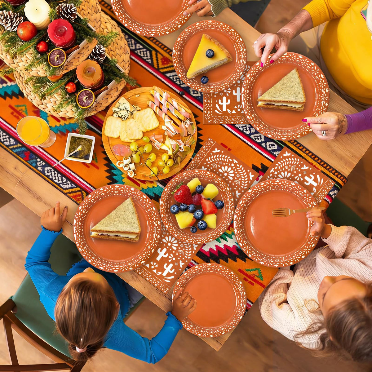 Dhnvcud Cielito Lindo table setup with coordinated plates and napkins