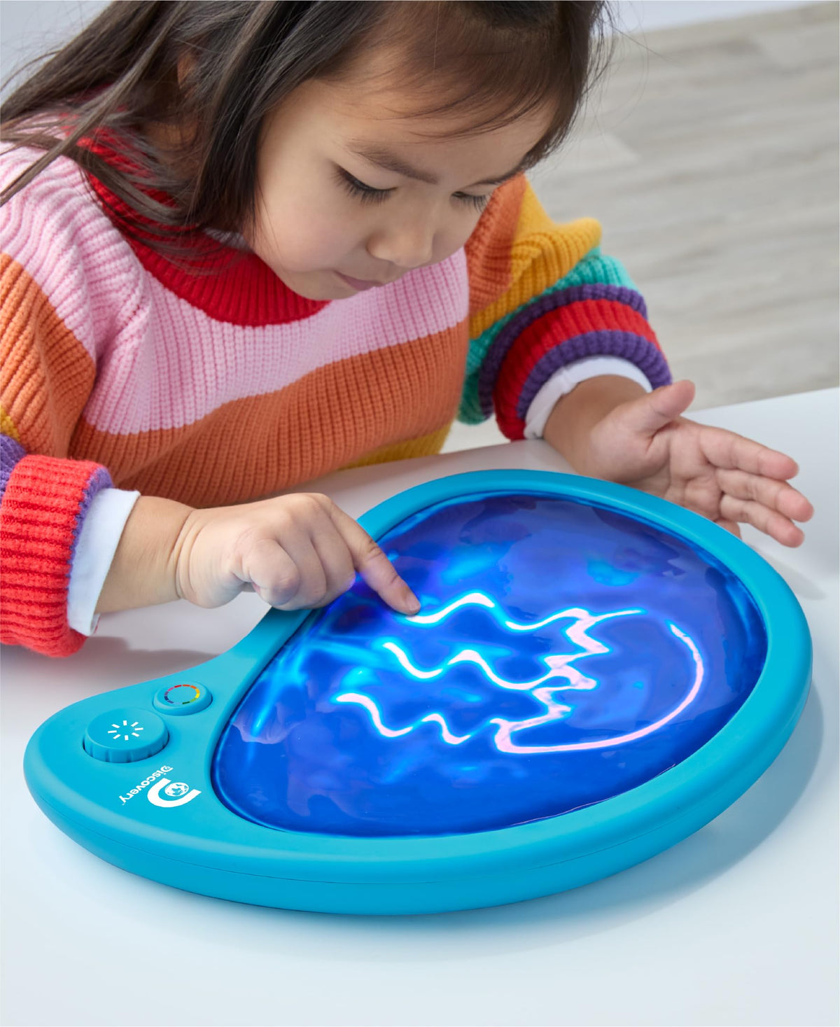 Discovery Mess-Free Glow Palette color wheel highlights interactive drawing with 12 vibrant, luminous hues