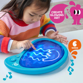 Discovery Mess-Free Glow Palette with built-in music inspires creativity during glowing drawing sessions