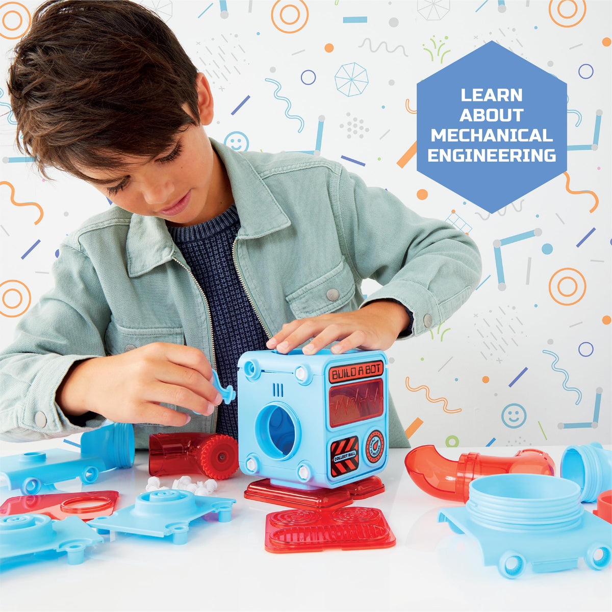 Discovery Prize-Pod Robot Kit capsules image highlights 12 toy capsules for creative problem solving.