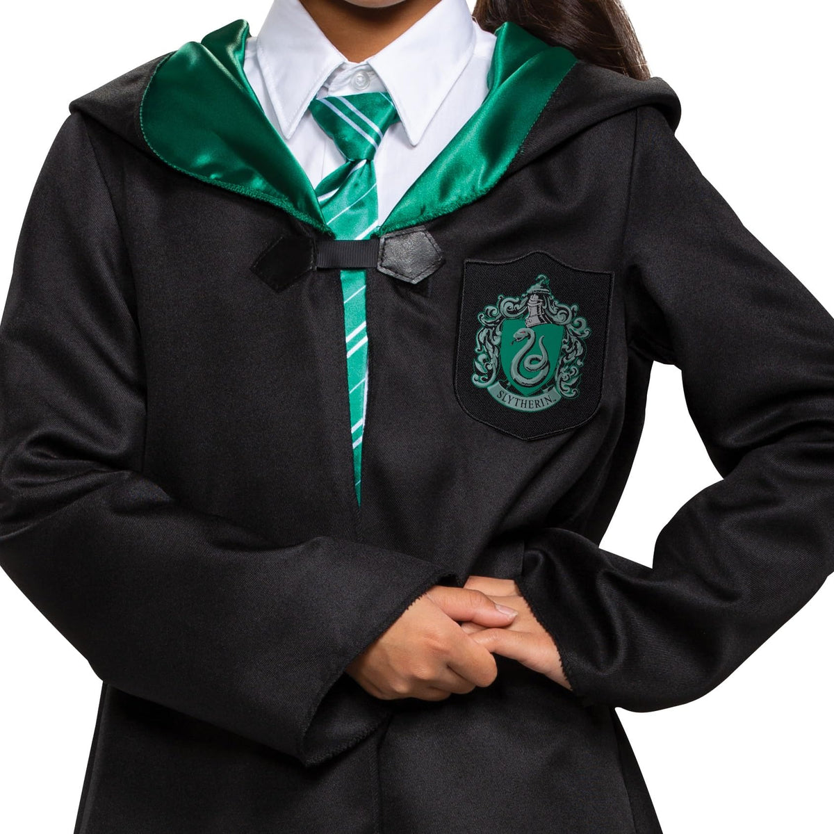 Disguise Slytherin robe patch detail highlights the house emblem