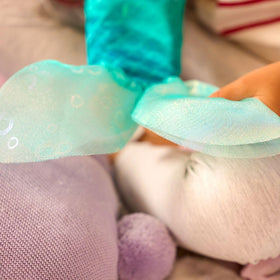 Disney Store Ariel Once Upon a Story doll with Flounder-handle hair comb.