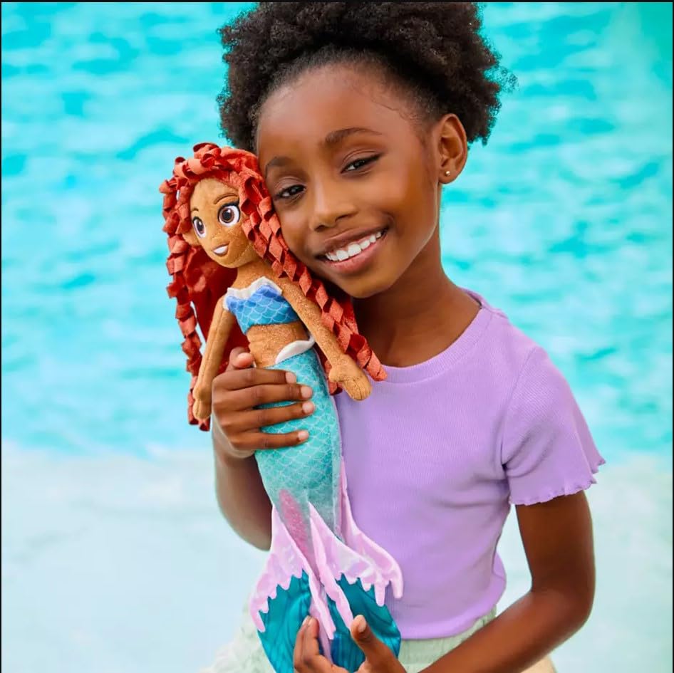 Disney Store Ariel plush with iridescent pink fins for magical mermaid play.