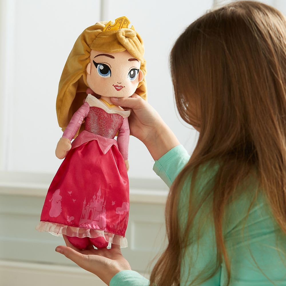 Disney Store Aurora plush doll wearing satin gown for magical storytelling