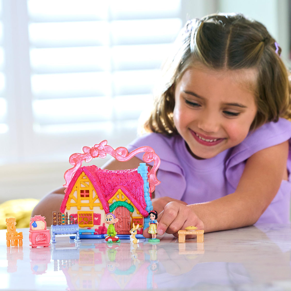 Disney Store Dopey micro figure included for classic princess adventures.