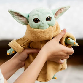 Disney Store Grogu plush with ultra-soft fill for cuddling and play.