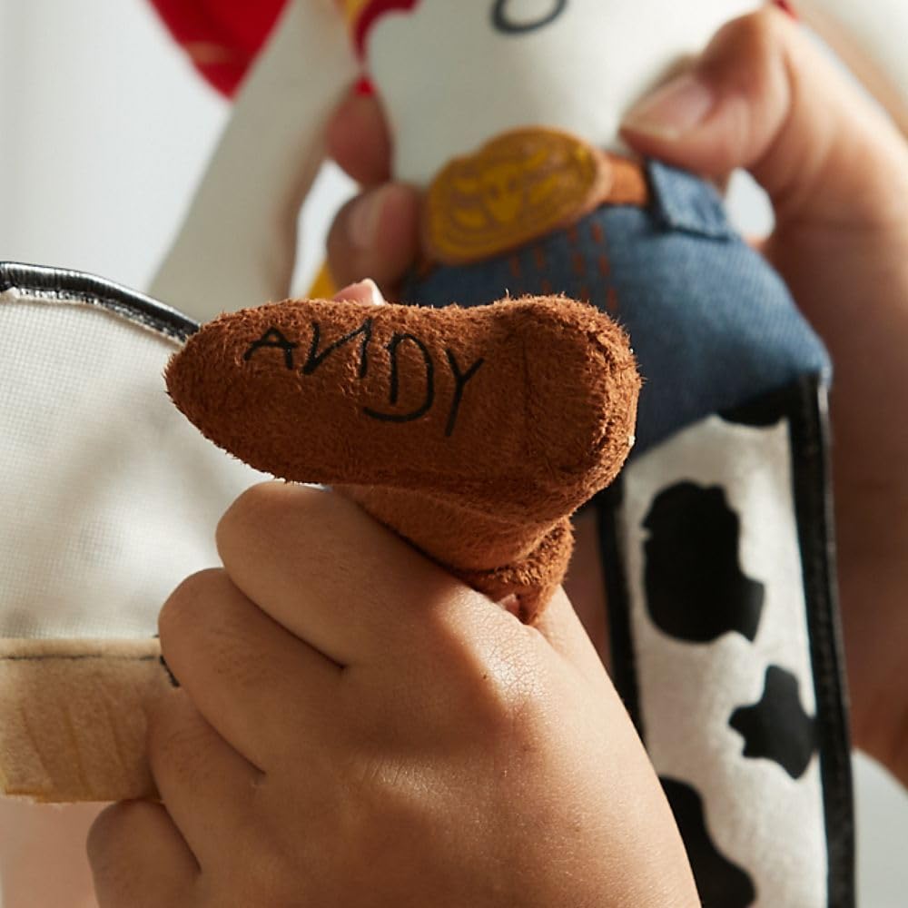 Disney Store Jessie plush full-body image showcases Toy Story inspiration in soft, huggable fabric