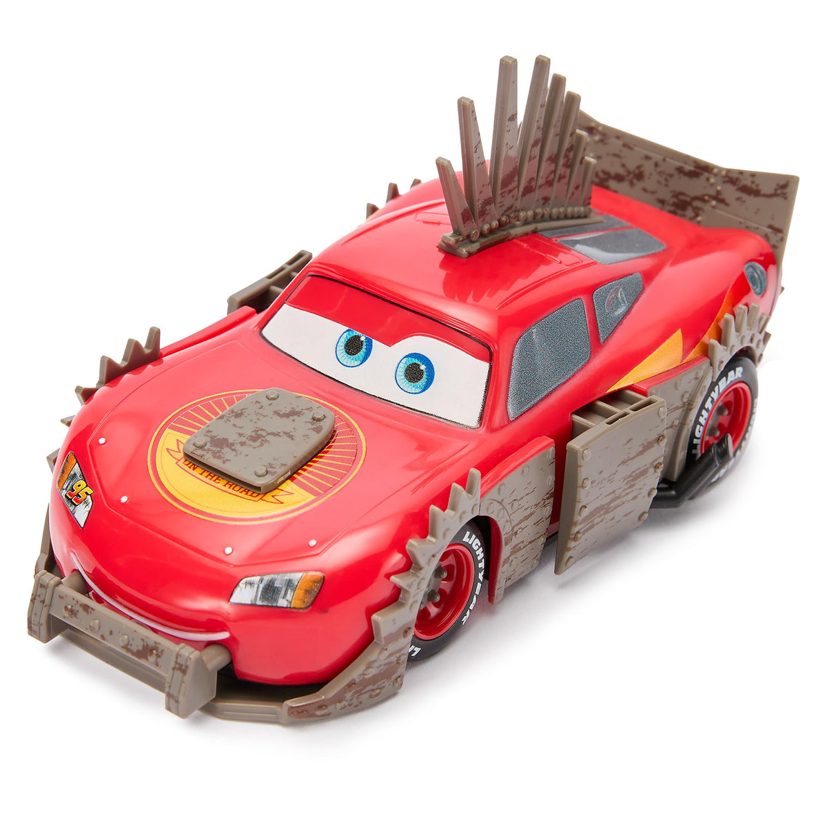 Disney Store Lightning McQueen armor pops off on impact for quick rebuild.