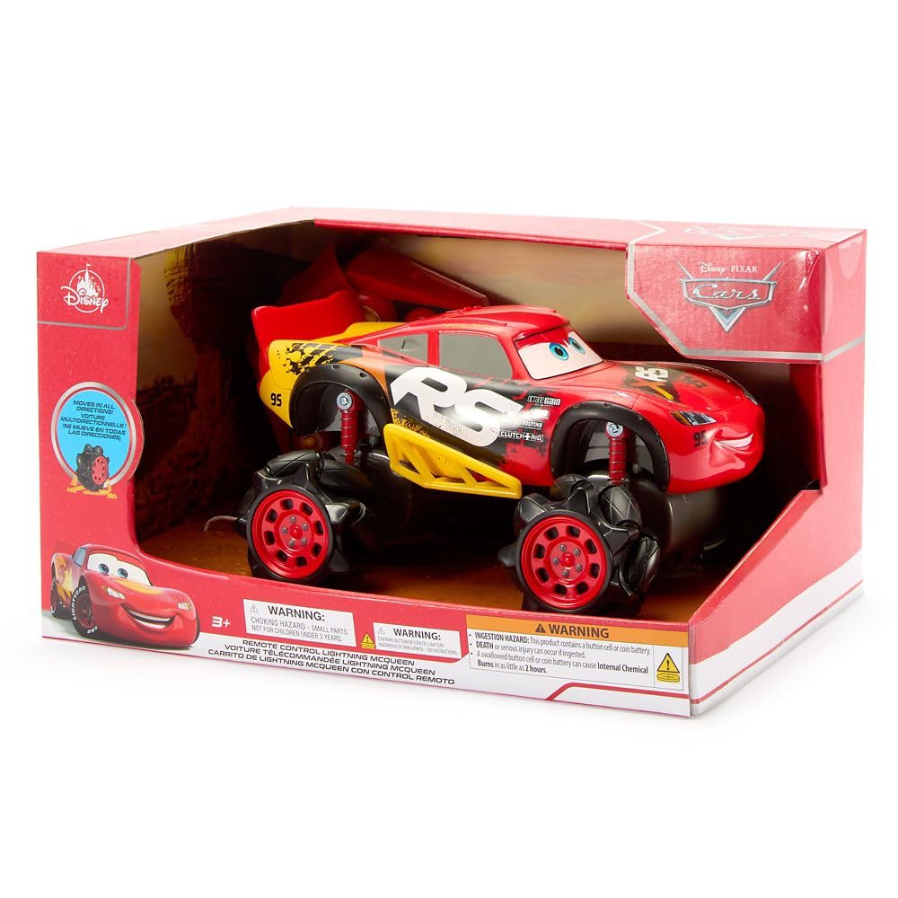 Disney Store Lightning McQueen RC car pictured on track delivering fast action.