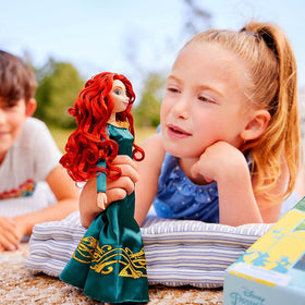 Merida in deluxe green dress with Celtic inspired details for authentic Brave play.