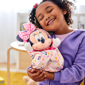 Disney Store Minnie Mouse plush with reversible velour swaddle for versatile cuddles.