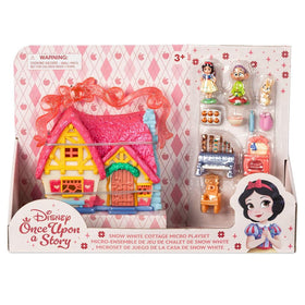 Disney Store packaged princess playset showing compact cottage design.