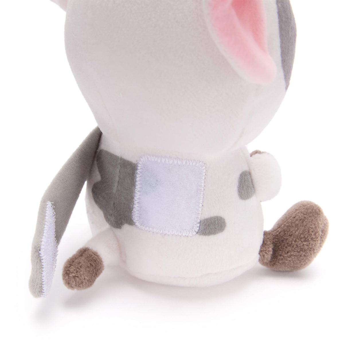 Disney Store Pua serves as a cute backpack buddy on adventures