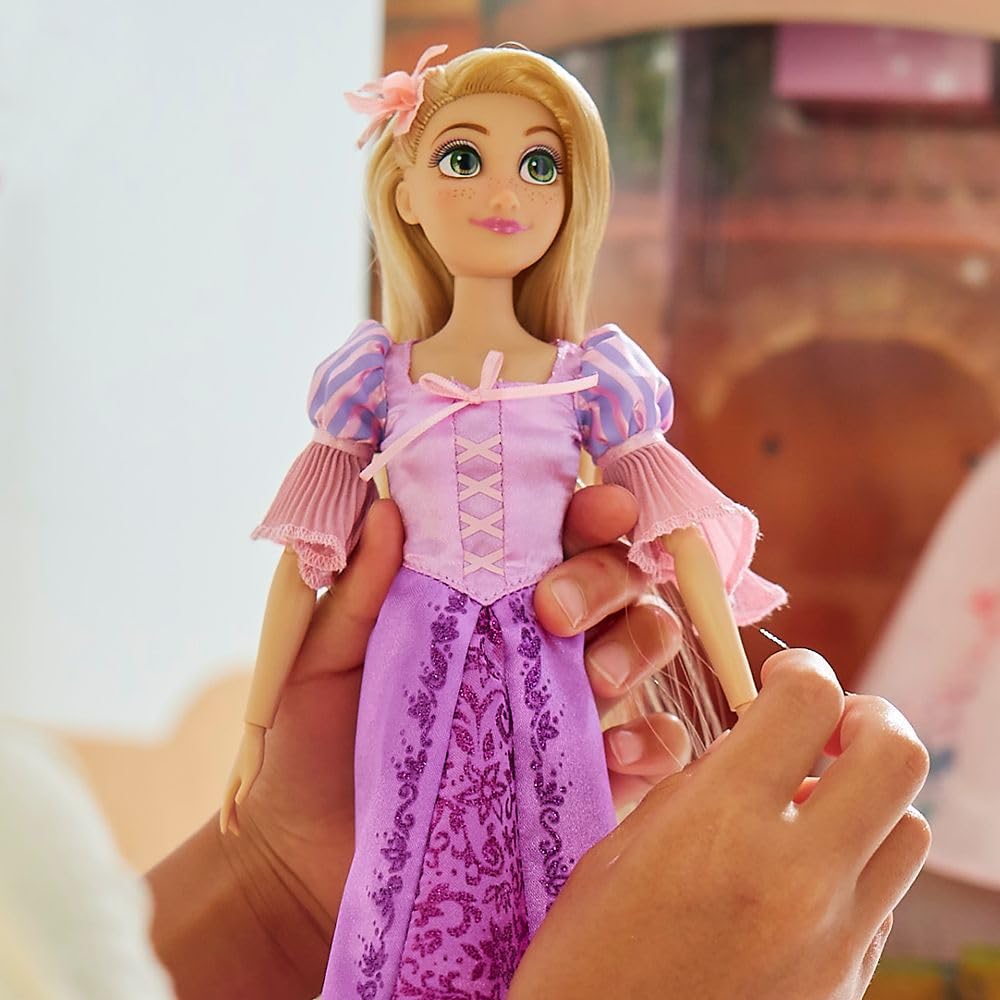 Disney Store Rapunzel Story Doll frying pan and guitar invite imaginative storytelling.