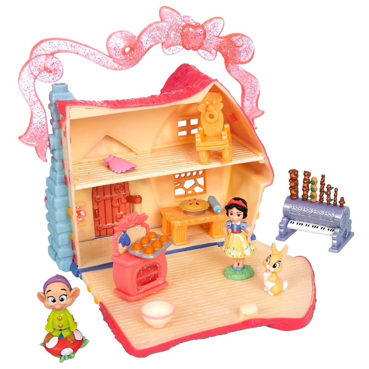 Snow White cottage interior with oven and bowl for creative pretend cooking.