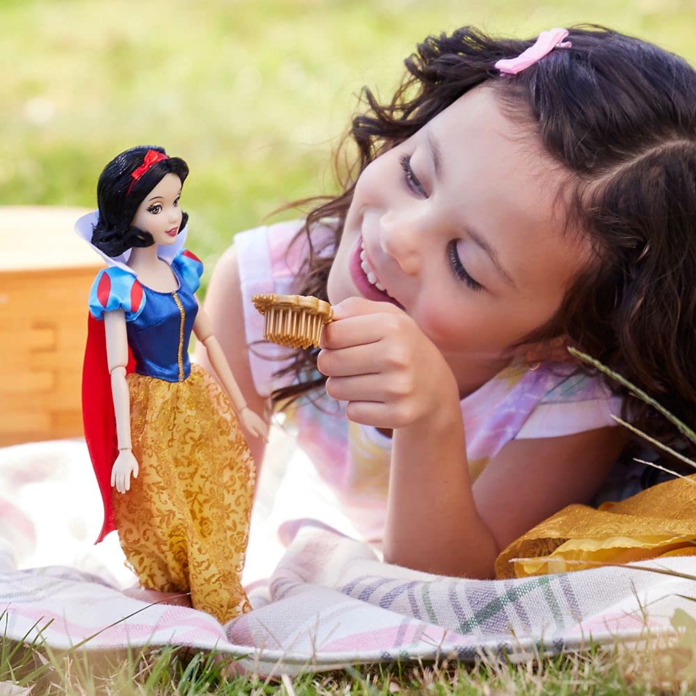 Red satin headband completes Snow White classic look for pretend tales.
