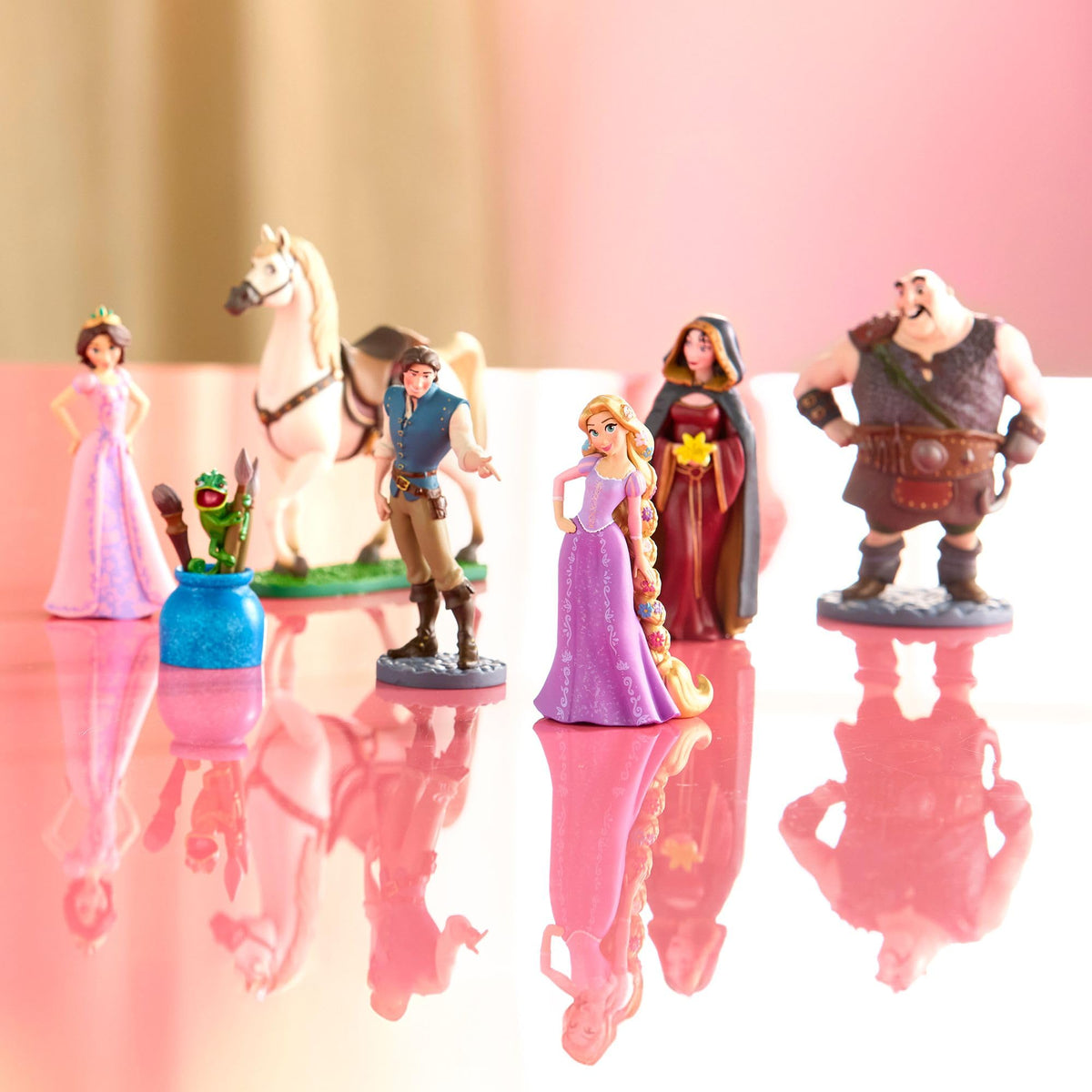 Disney Store Tangled figure: Rapunzel in purple dress inspires magical storytelling.