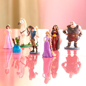 Disney Store Tangled figure: Rapunzel in purple dress inspires magical storytelling.