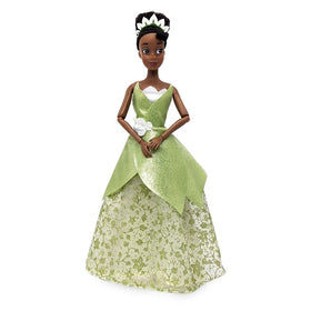 Disney Store Tiana doll includes brush accessory for styling hair.