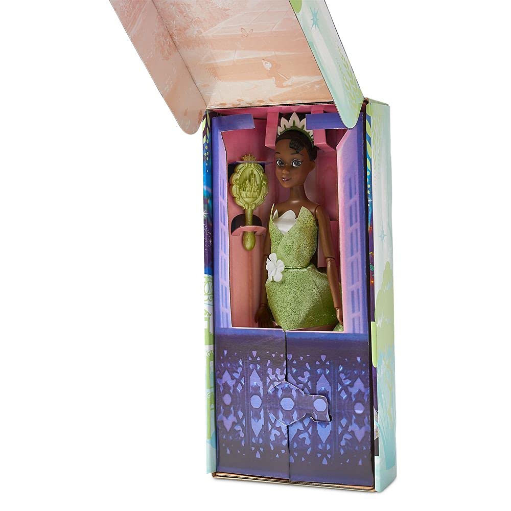 Disney Store Tiana doll with mesh skirt overlay adds sparkle to playtime.