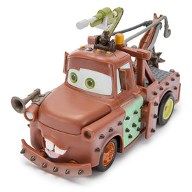 Disney Store Tow Mater RC car crash-rebuild armor close-up demonstrates pop-off action.