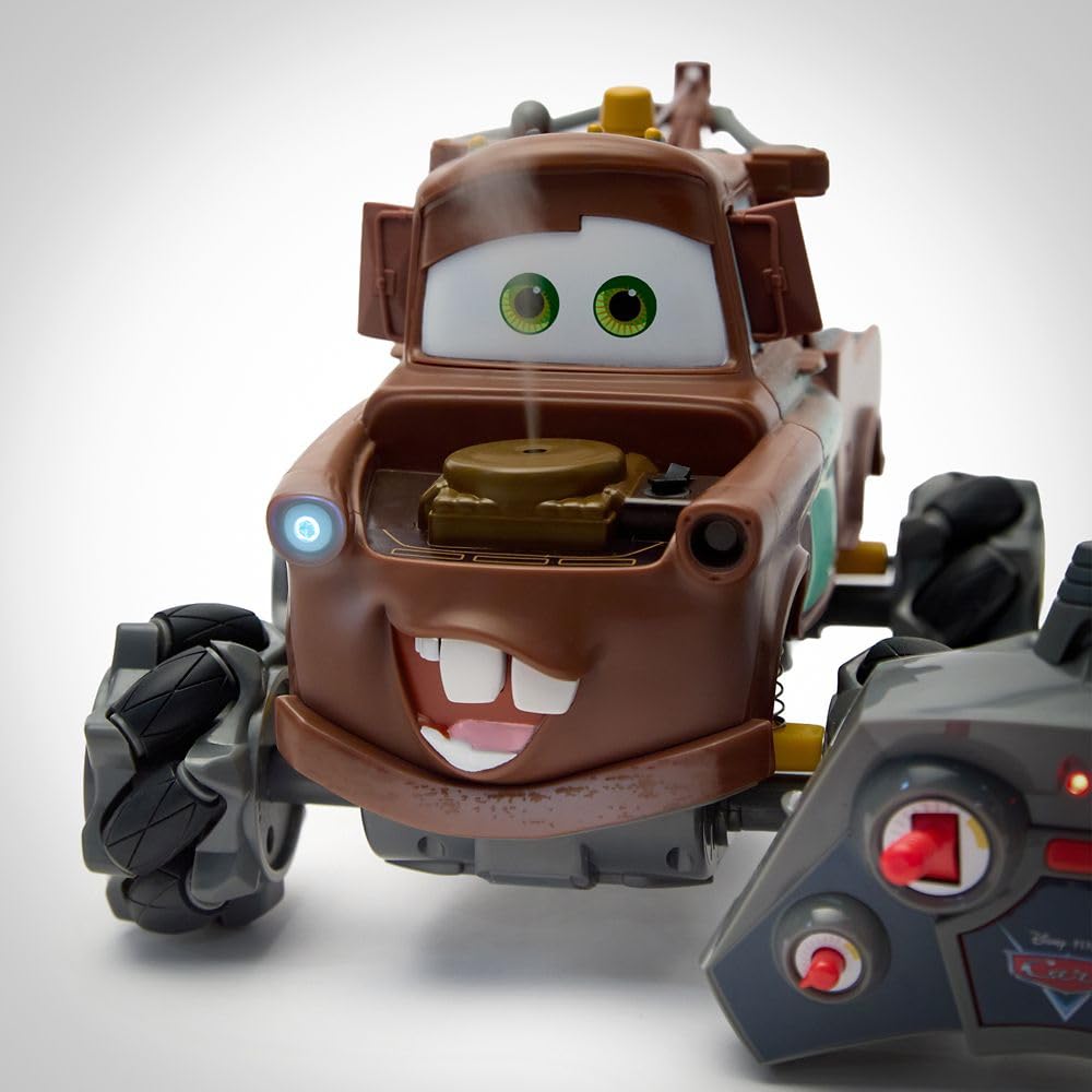 Disney Store Tow Mater RC car wheels race-ready on rugged terrain.