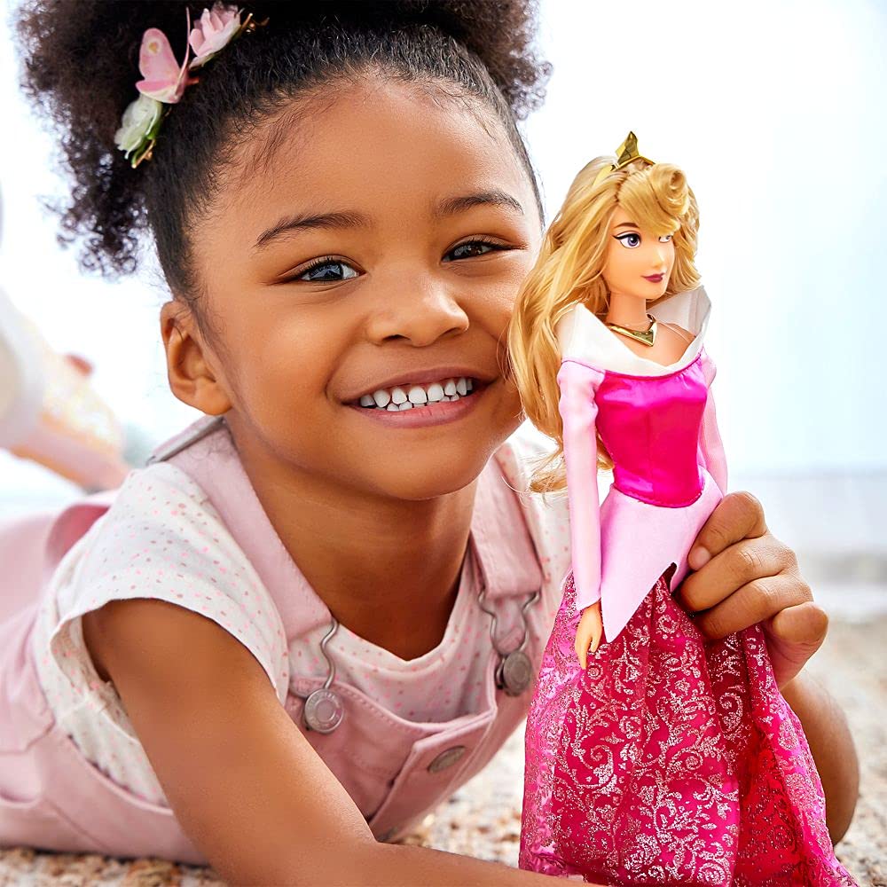 Disney Store Aurora doll with golden tiara for royal pretend moments.