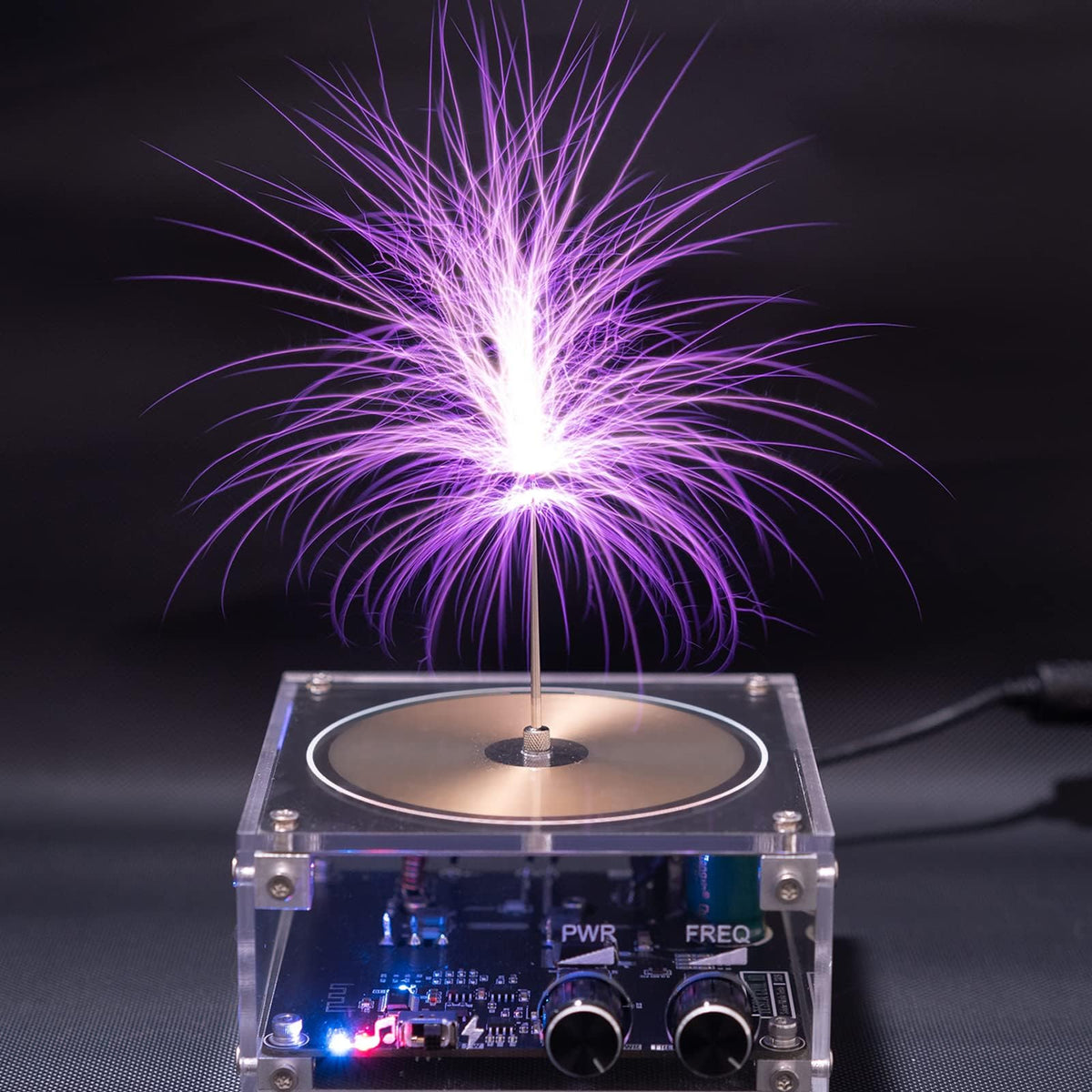 Divvlur Tesla Coil lightning mode with discharge needle creates dramatic visuals.
